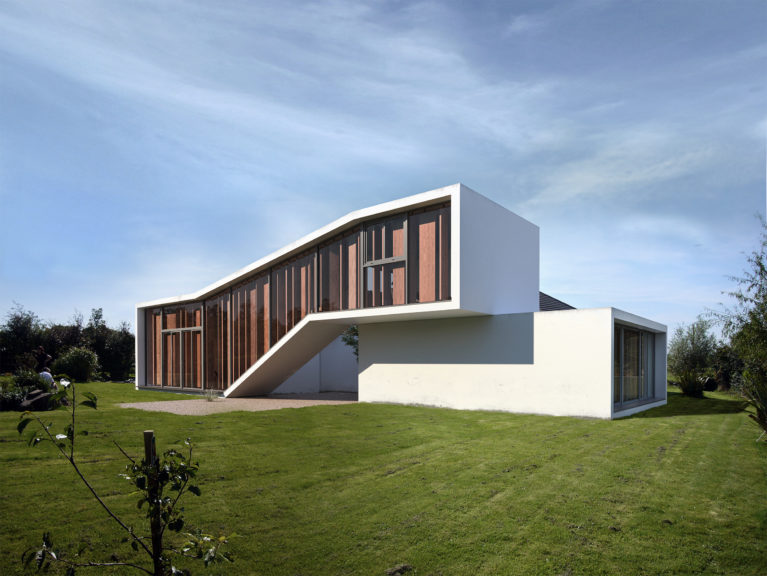 AQSO Burke house, facade, louvers, green, cantilever, white concrete, sofas, courtyard, extension, villa, garden, extension, timber