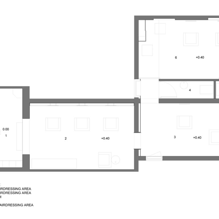 AQSO arquitectos office. The floor plan of this hairdressing salon shows the main salon, the private rooms and the toilets.