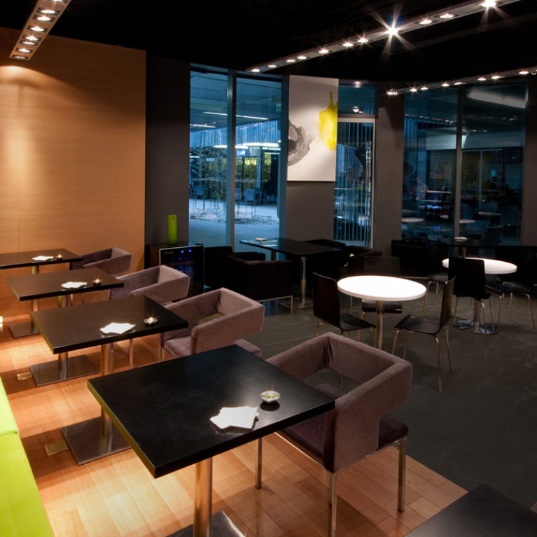 AQSO moment cafe, interior design, sitting area, custom furniture, polish concrete, wooden walls