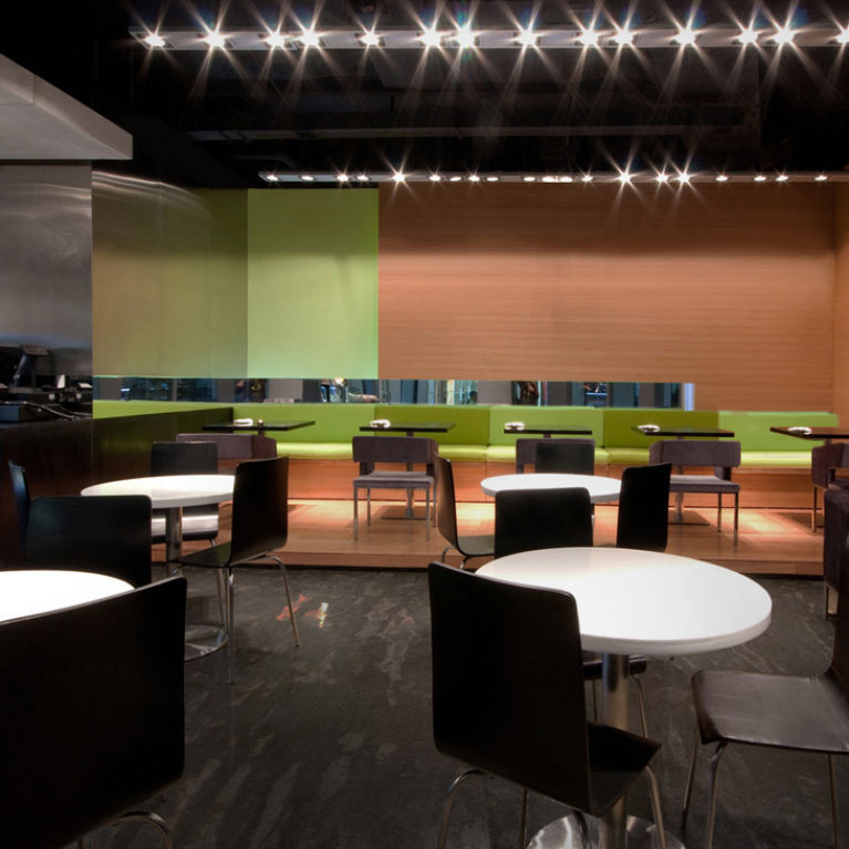AQSO moment cafe, colorful sofas and polished concrete