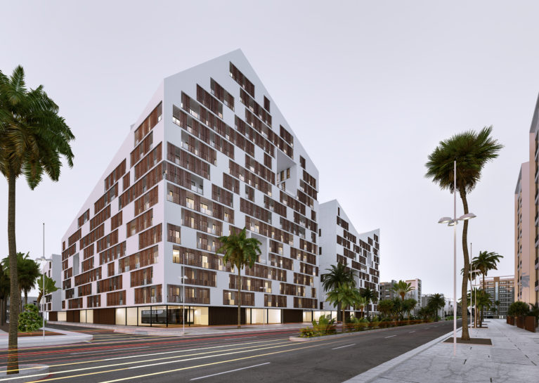 AQSO arquitectos office, residencial anfa, vista nocturna desde el bulevar principal. La imagen icónica del zig-zag de la silueta del edificio destaca con la luz del amanecer. El singular diseño arquitectónico destaca del resto de edificios del barrio.