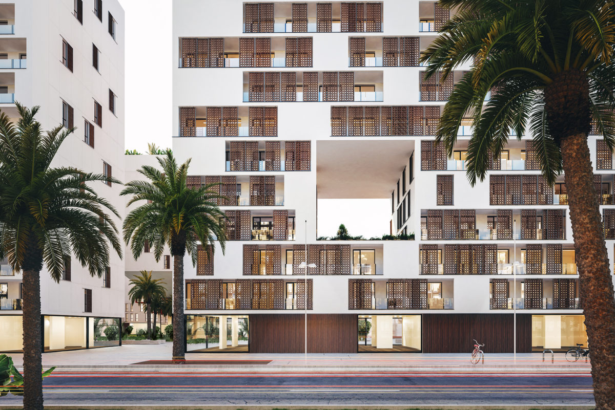 AQSO arquitectos office, residencial anfa. La vista frontal del alzado muestra los balcones con paneles correderos de tracería de madera inspirados en juegos geométricos marroquís, que forman una piel siempre cambiante..