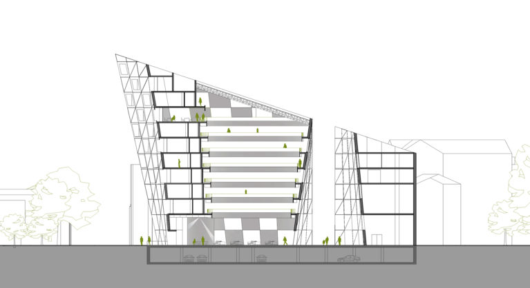 AQSO arquitectos office. La sección longitudinal del edificio muestra el patio central en torno al cual están las habitaciones de hotel y el patio que separa el edificio comercial.