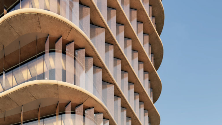 AQSO arquitectos office. The facade brise-soleil made of sun-shading concrete awnings and vertical glass louvers.