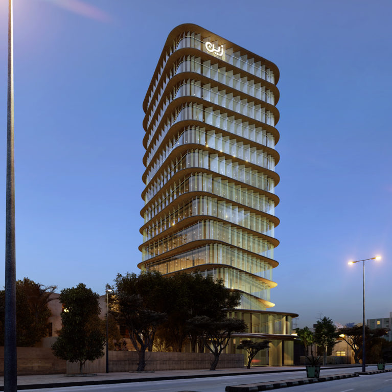 AQSO arquitectos office, night view of the illuminated tower, glass facade and illuminated sign
