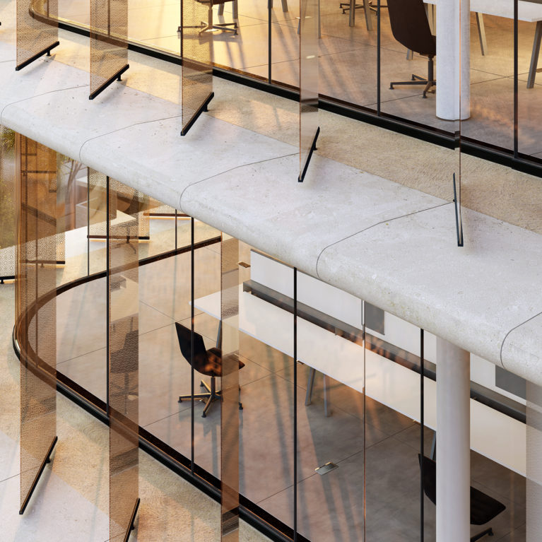 AQSO arquitectos office. Persianas verticales de vidrio para controlar el sombreado exterior. Sistema de soporte a medida en paneles de GRC.