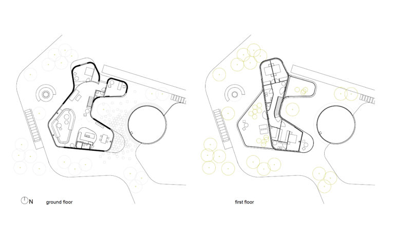 AQSO arquitectos office. Drawings or blueprints showing the floor plan layouts of the house, including the courtyard, landscape design and furniture.