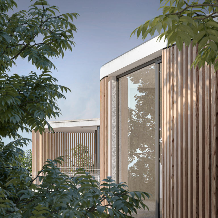 AQSO arquitectos office. The unique facade of the house can be seen through the trees around the plot. Wooden slats enclose the balcony to give privacy to the master bedroom.