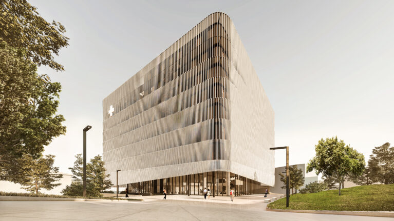 AQSO arquitectos office. From the new public plaza the building opens up its skin at the lower level to provide access through the ground floor.