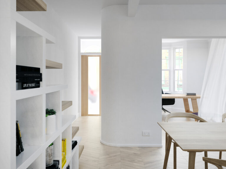 AQSO arquitectos office. The glazed entrance door illuminates the foyer, which gives access to the dining room and office. The staircase is also a bookcase.