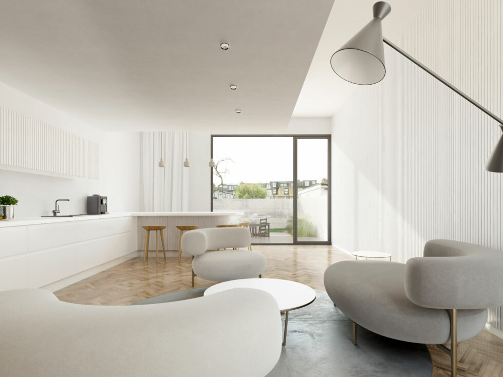 AQSO arquitectos office. The living room with the Ela sofas by Piet Boon and the peninsula in the background is a bright and simple space with views of the back garden.