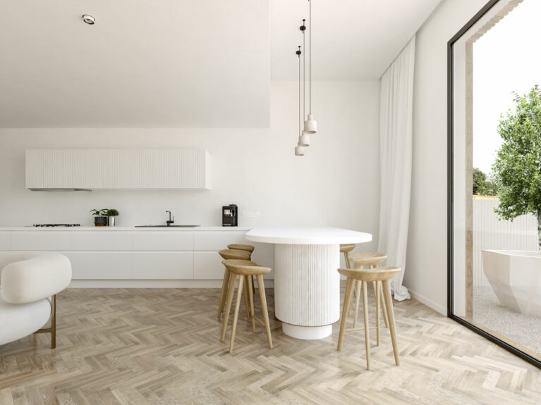 AQSO arquitectos office. Los muebles de cocina de color blanco mate aportan luminosidad. La encimera termina en una península con taburetes que sirve como mesa de comedor.
